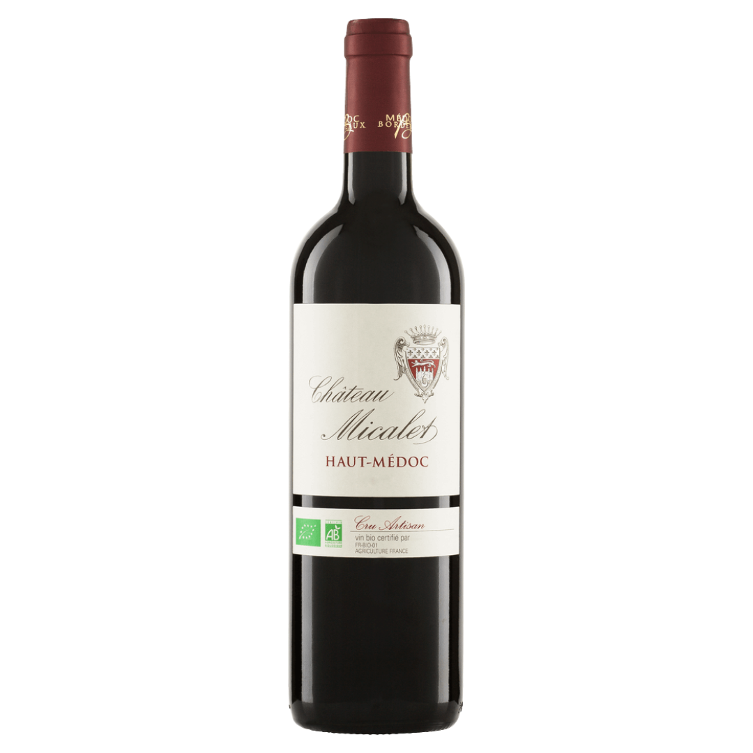 Red wine bottle with a visible label on a white background