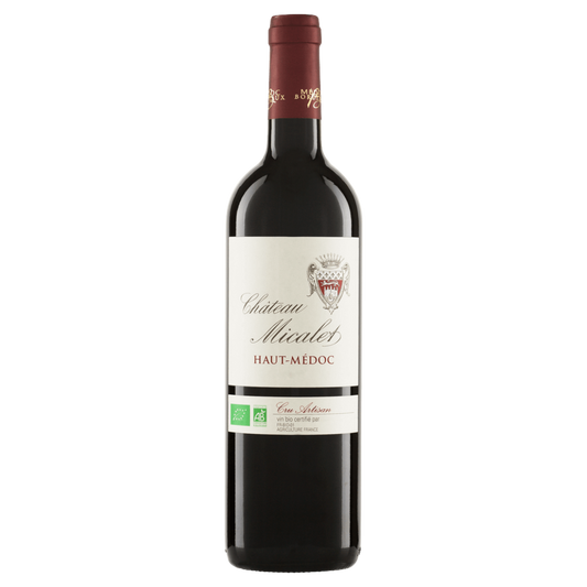 Red wine bottle with a visible label on a white background